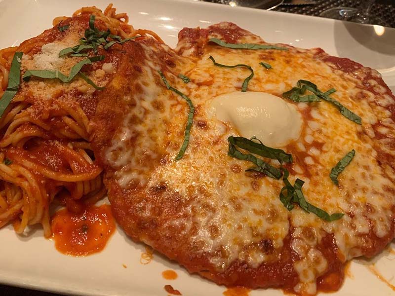 A dish of Chicken Parm for dinner at Allegro .