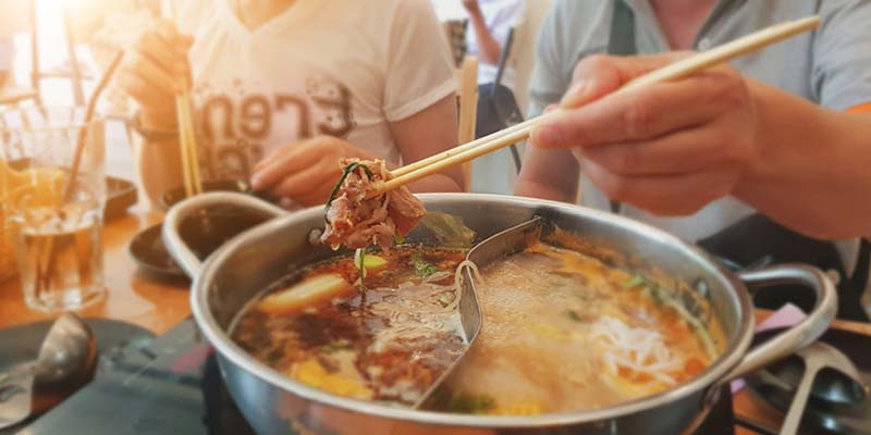 Customers enjoying the best hot pot Las Vegas.