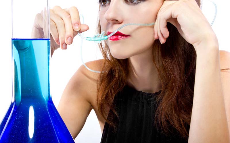 Women getting oxygen from an oxygen bar Las Vegas. 